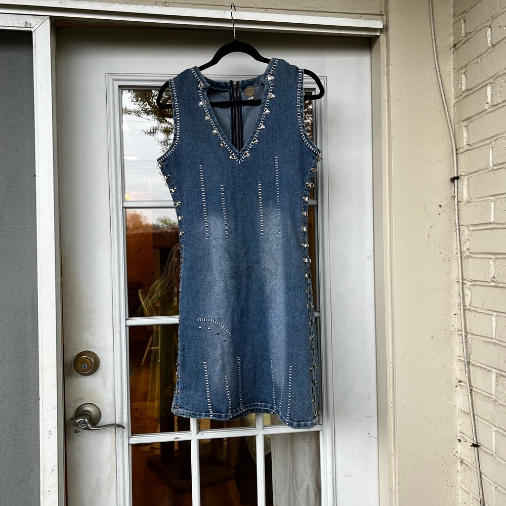 Sleeveless Denim Dress. Arm Pit 9 inches & Dress has Stretch to the material.
